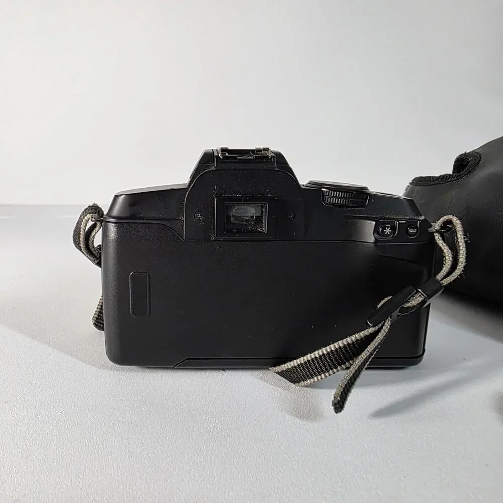 Canon EOS 5000 with 38-76mm EF zoom, UV filter, strap